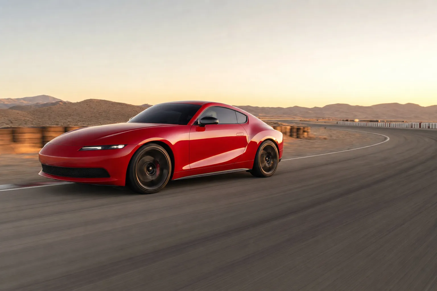 A red sports coupe seen from a low front three-quarter angle, speeding along a desert circuit at golden hour.